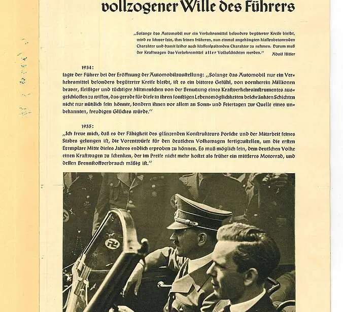 Eine Seite des Magazins. Es ist ein Biuld von Hitler der in einem KdF-Wagen sitzt zu sehen. Die Überschrift lautet "Der KdF_Wagen: vollzogener Wille des Führers."